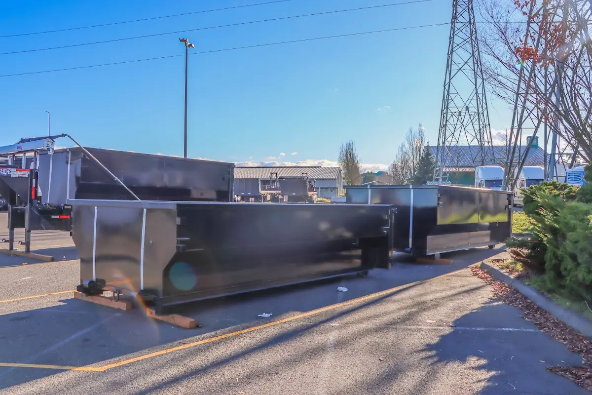 Roll-off dumpster ready for waste disposal at job site for 12 Yard Dumpster Rental in Mitchell